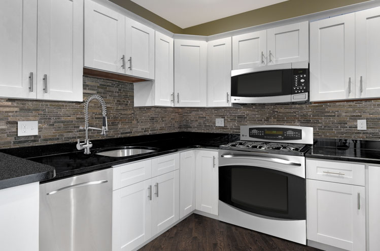 white shaker kitchen cabinets 2 - Affordable DIY Crafts Cheaper Than Remodeling Your Kitchen