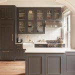 Black wall cabinets with glass faces.